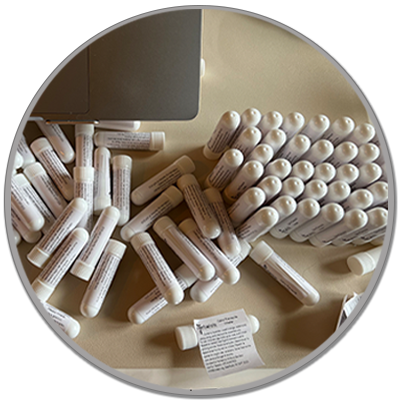 herbal aromatherapy inhaler tubes being labelled